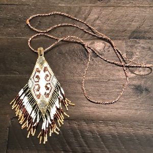 Beautiful elegant Native American beaded design with woven threads.